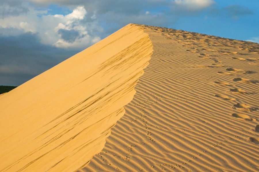 White Sand Dunes in Mui Ne with Sunset Reflection